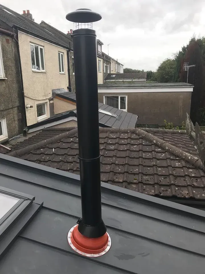 Twin wall stove flue installed through a tiled roof by Agnew Chimney Engineering Glasgow
