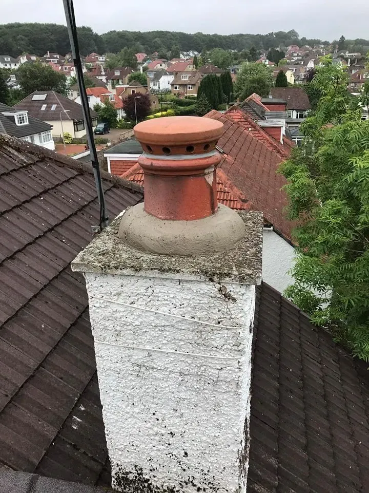 New chimney pot fitted on a rendered chimney stack by Agnew Chimney Engineering Glasgow